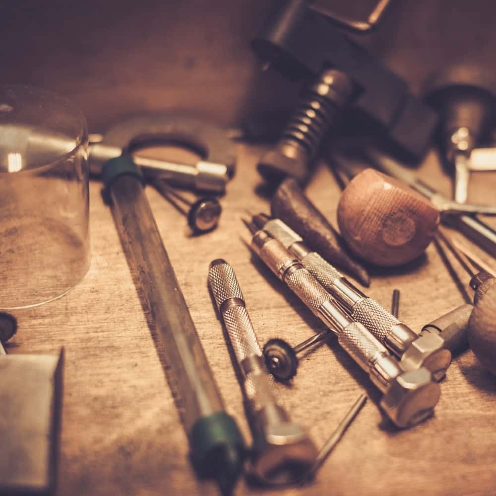 Goldsmith testing tools used to verify gold purity and karat
